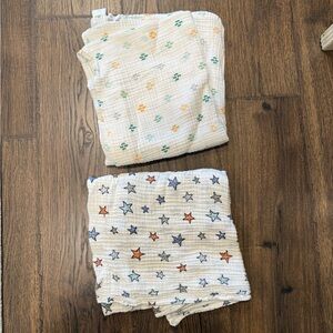 Colorful Star and Paw Print Swaddle Blankets